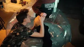 Two sweet guys share an inflatable chair