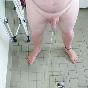 Naked urination in the dirty shower