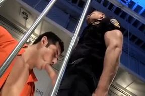 Two Cops pokes A Prisoner