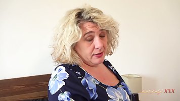 50 y.o. granny Camilla Creampie masturbates on the bed