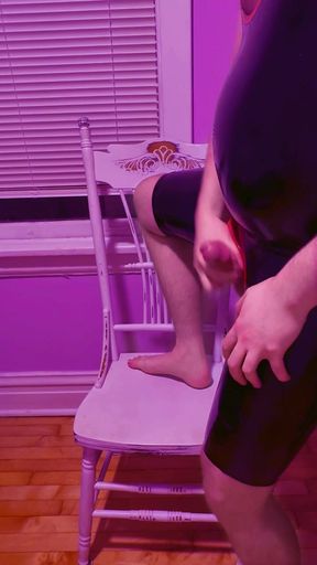 Playing with myself in my rubber chapsuit and thong