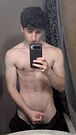Young straight guy jerking in front of a mirror