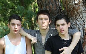 Skinny boys please each other in outdoor anal threesome
