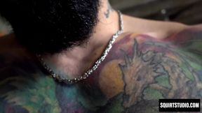 Tattooed Papi Suave jerks his uncut cock in solo cum explosion