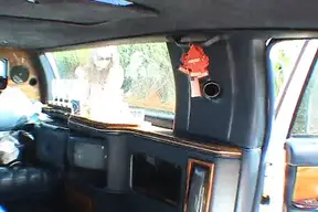 Two hot babes share cock in classic limo threesome
