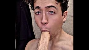 Gooning fag sucking dildo cums