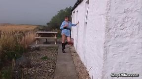 Huge tits mature Allison masturbates outdoors on the table