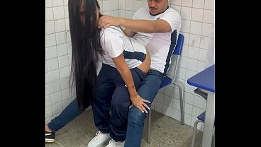 Hot Latina girlfriend takes her friend's cock in the classroom