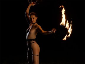 Cute teen Elilith Noir playing with fire