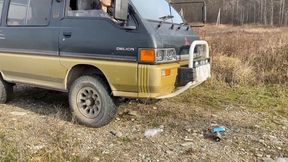 she will crush with her 4wd car wooden pallet and different bottles aV