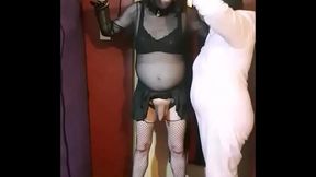 bisexual crossdresser in bondage blindfolded and feed his own piss by masked girlfriend