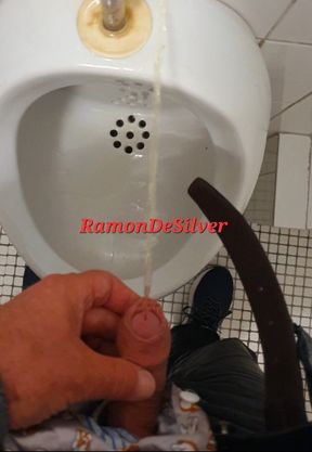 Master Ramon pisses on the toilet in hot leather pants, sorry cleaning lady