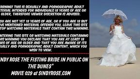 Sindy Rose fists herself in public on the beach