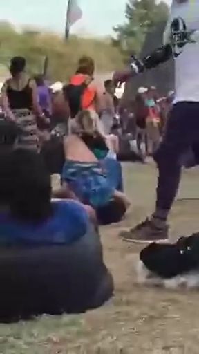 Facesitting encounter at outdoor festival