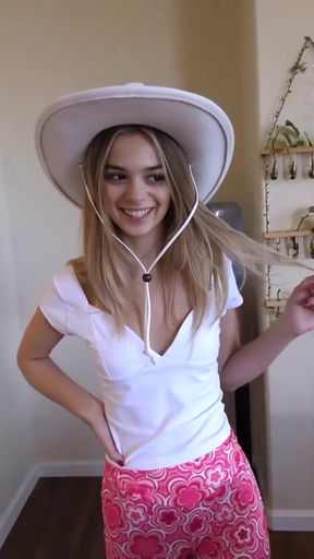 Blonde girl in cowboy hat