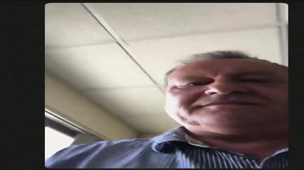 Mark Flinton jerks off in front of the cam at his workplace in the meetings office