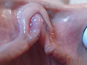Close-up of a clit getting stimulated before climaxing