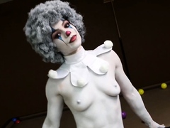 A clown dressed babe teasing amateur style