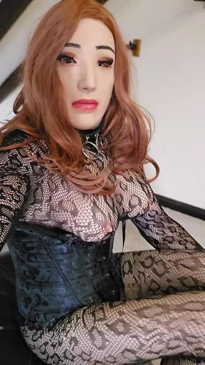 Female mask crossdresser in a bodystocking