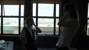 2 girls being put in diaper by babysitter