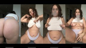 Sexy brunette with big tits smokes