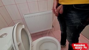 Guy pisses in a public toilet and takes a selfie