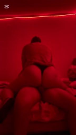 Real latin couple having passionate and hard sex under red LED fights