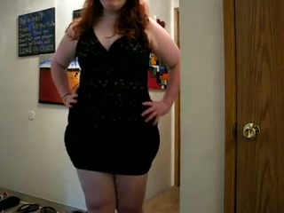 This sexy BBW looks very tempting in her dress and I love to watch her strip