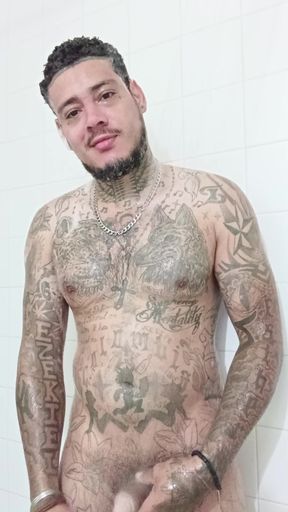 Sexy handsome Latino Colombian young man taking a shower showing ass and dick