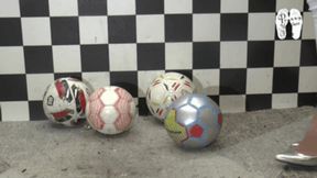 Soccer balls under metal Heels 2