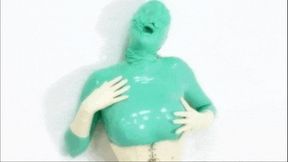 Rubber re-breather slut and her orgsasmus in green latex catsuit - Part 1 of 3 - The beginning of a transformation