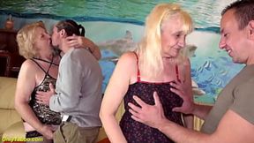two elderly milfs get pounded hard by their big dick&#x1F346; boyfriends in a wild group sex session