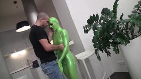 Crazy bitch in latex green costume takes a big hard cock!