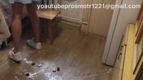 Nastya in a dress and sneakers makes coffee for herself and her friend, and steps on the coffee creamer, crushing it, and it explodes under her sneakers. Crush fetish and foot fetish + sneakers.