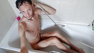 Super skinny male shows off his body in bathtub
