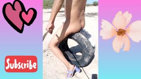 Delicious naked Trans masturbates in public on top of a tire and squirts with heels and a slut&#039;s anal plug