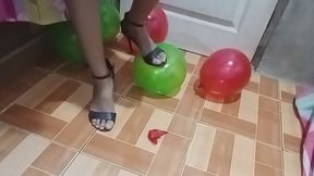 Balloon pop using high heels