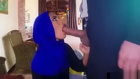 Hijab wearing beauty sucking hard cock