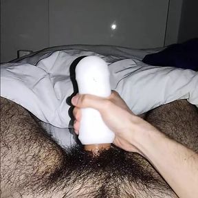 Masked guy tries out a fleshlight for the first time