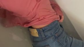 Pink Longshirt, jeans, white socks in bathtub