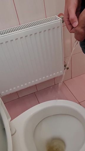 Guy Long Pisses in a Public Toilet and Takes a Selfie