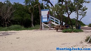 Dicksucking jock lifeguard fucked on beach