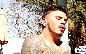 Tattooed muscular jock masturbates in the sun