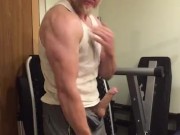 Muscular guy flexing in a dirty wifebeater and shooting cum!