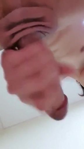 Japanese jerks him off with all her might while masturbating