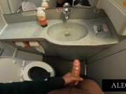 JERKING OFF AND CUMMING ON THE PLANE
