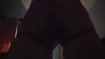 Solo trans man in crimson corset teases and strokes