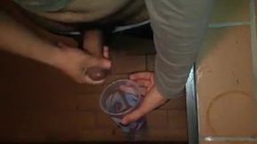 Cumming in plastic cup