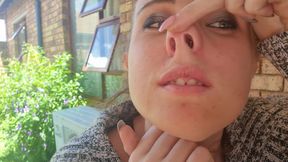 Picking my nose, blowing it and putting the boogers in my mouth to eat them.