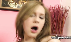Teen minx drinks and teases cunt with her hot piss